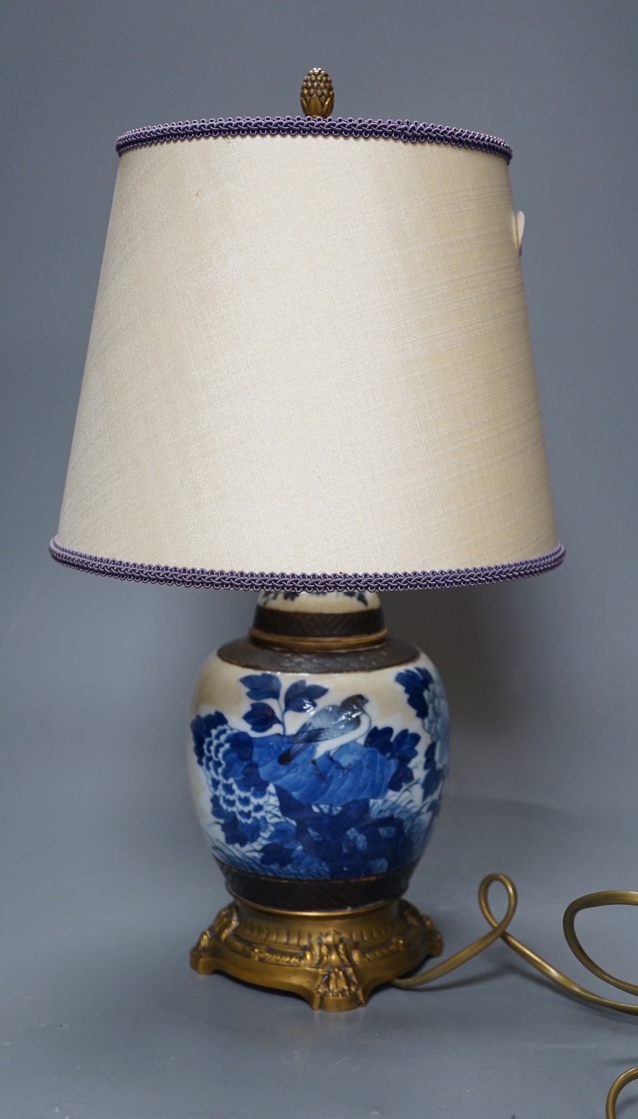 A late 19th century Chinese blue and white crackle glaze jar, now mounted as a lamp, total height 38cm